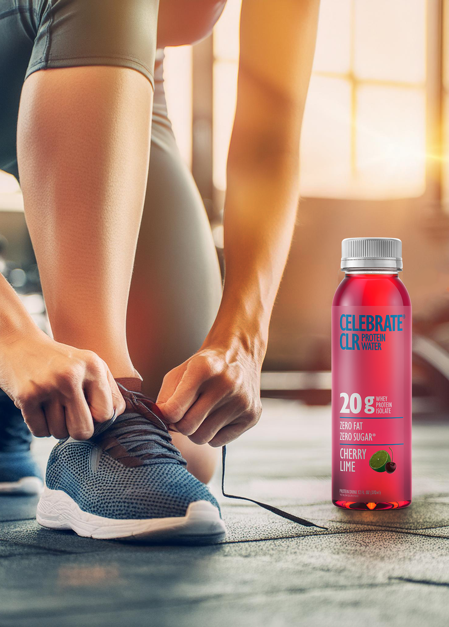 Image of person tying gym shoes next to a bottle of cherry lime clr